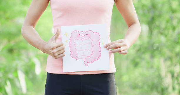 woman take intestine board sport woman take intestine board with green background blood and guts stock pictures, royalty-free photos & images