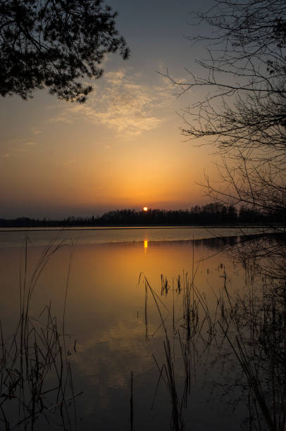 istock Sunset at lake on spring evening in Sweden 949052990