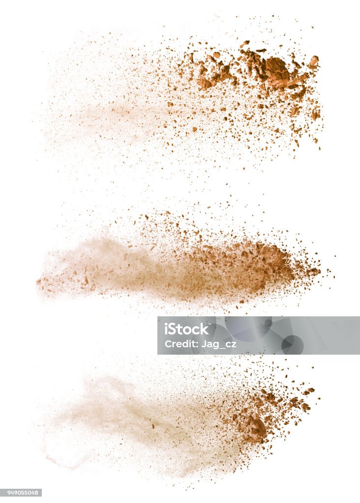 Abstract colored brown powder explosion isolated on white background. Abstract colored brown powder explosion isolated on white background. High resolution texture Dirt Stock Photo