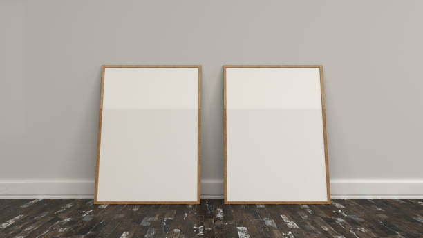 istock Blank white poster in wooden frame standing on the floor 949067828