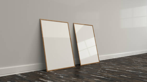 istock Blank white poster in wooden frame standing on the floor 949067932