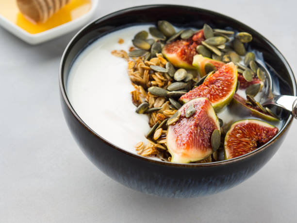 istock Healthy breakfast yogurt bowl with granola and fig 949078782