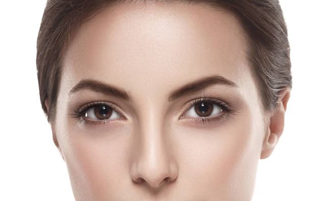 istock Eyes Beautiful woman face close up studio isolated on white 949082446