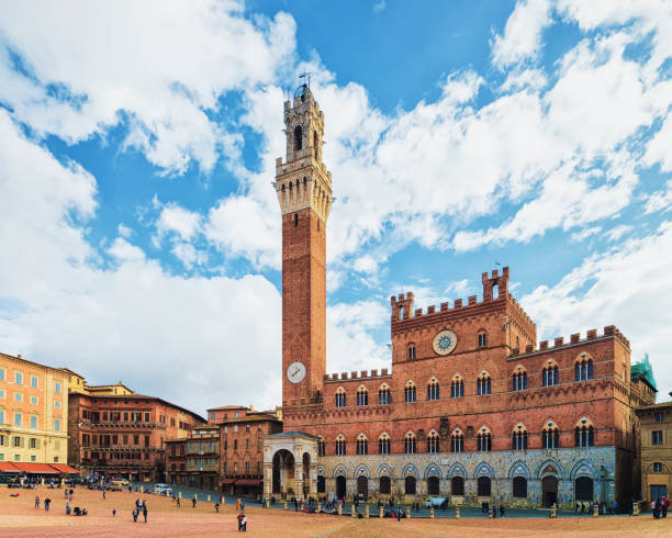 istock People at Torre del Magnia Tower Piazza Campo Square Siena 949086636