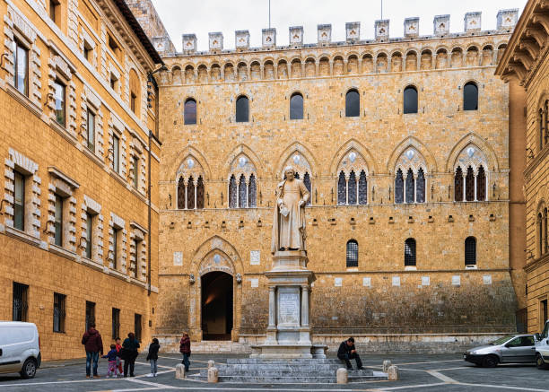 Siena, Italy - October 18, 2016: People on Piazza Salimbeni Square in Siena, Tuscany, Italy