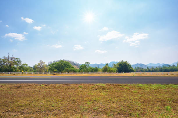 istock Asphalt road and countryside views 949087532