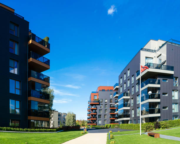 istock Modern architectural residential building quarter and flag 949087728