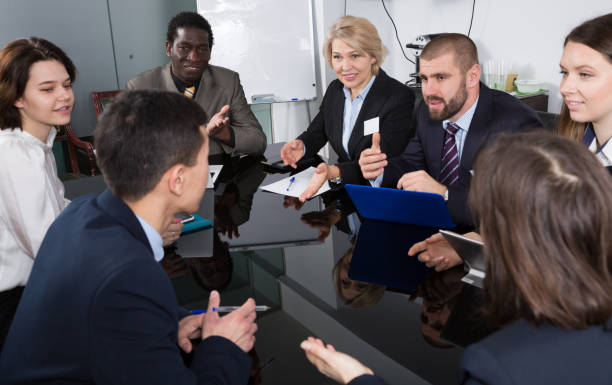 istock business partners discussing projects and ideas at meeting 949093690