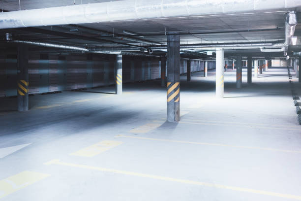 istock Underground car parking garage in modern apartment building 949099146