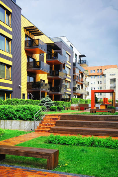 istock Modern residential building quarter with benches 949099194