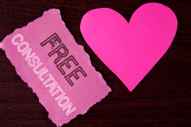 istock Handwriting text writing Free Consultation. Concept meaning asking someone expert about confusion inquiry Get advice written on Tear Sticky Note Paper Piece on wooden background Heart next to it. 949099680