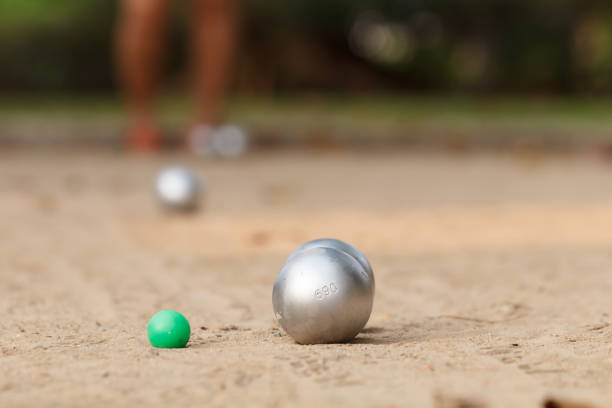 istock Boules and green jack ball in the match and player in back 949103890