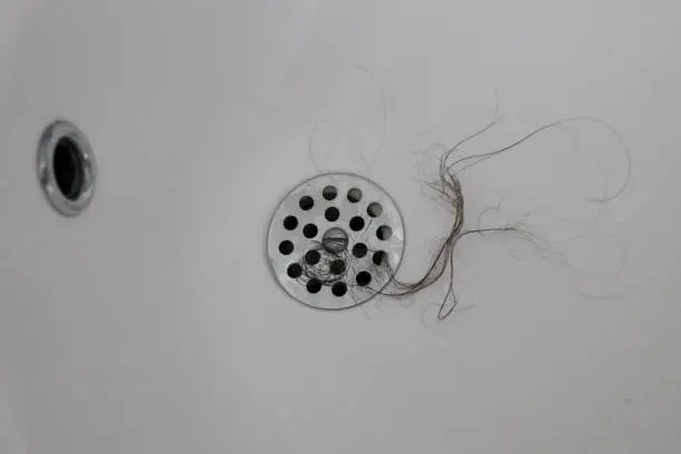 Photo of hair fallen into the sinks