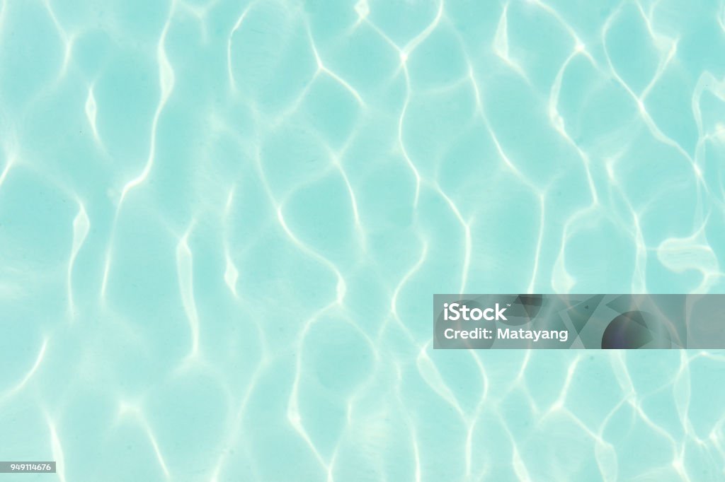 the close up of swimming pool with blue water the fresh blue water of the swimming pool Summer Stock Photo