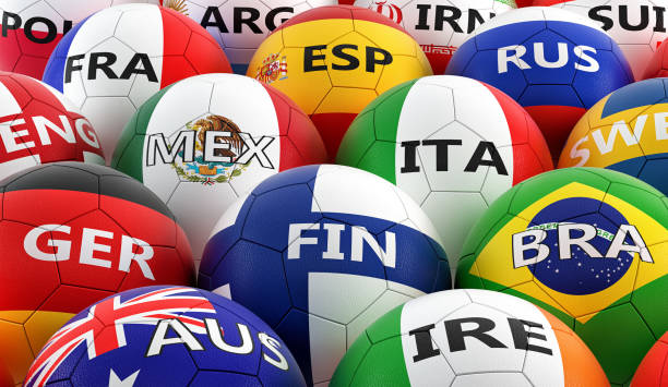 istock soccer balls colored in different national flag colors - 3D rendering 949114976
