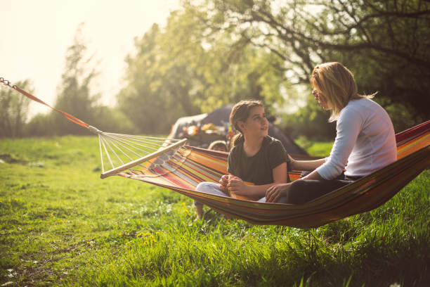istock Mother and daughter on camping 949117736
