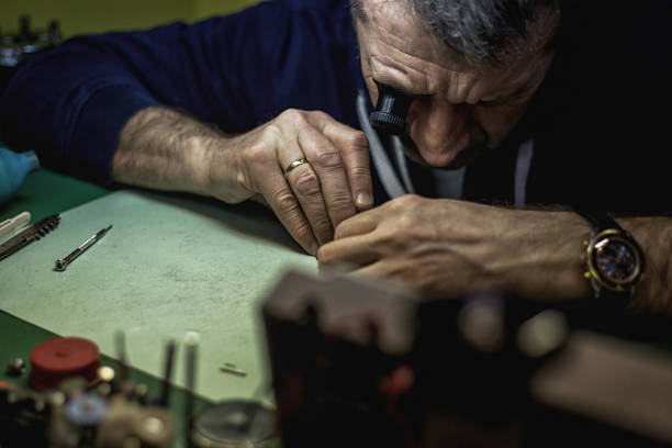 istock Close Up shot of a Watchmaker at Work 949119394