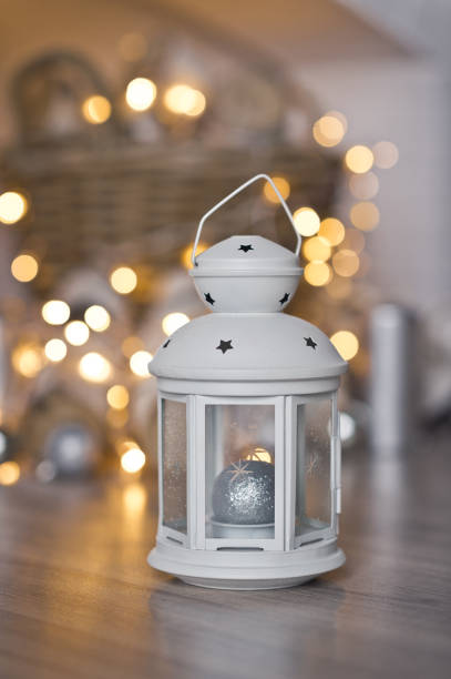 istock White lantern on a background of twinkling lights 9330. 949119752