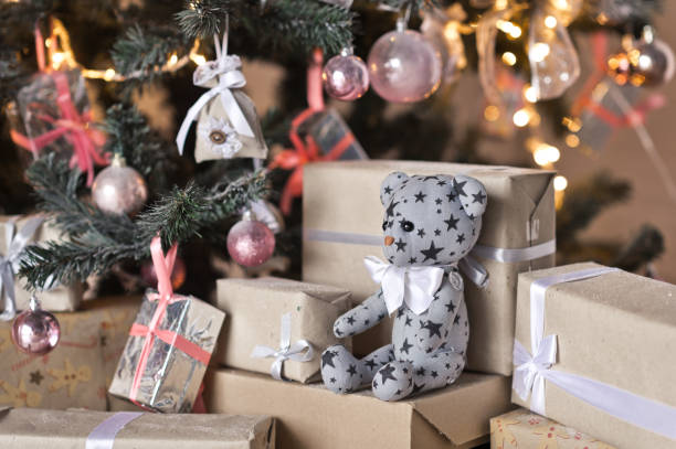 istock Bear among the Christmas gifts under the tree 9329. 949119828