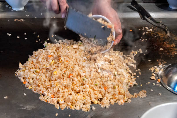 istock Preparing Asian food fried rice 949124042
