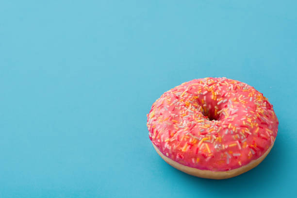 istock Pink frosted donut 949134414
