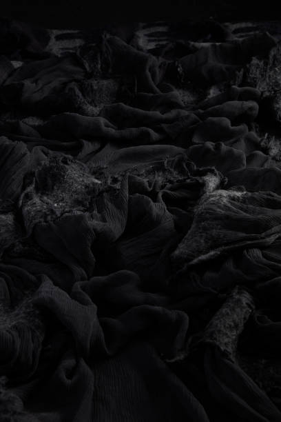 istock Felt and silk fabric dark and wrinkled texture 949134722