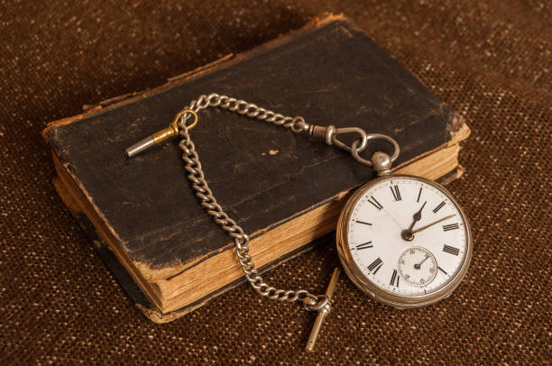 istock Pocket watch and old Bible 949140394