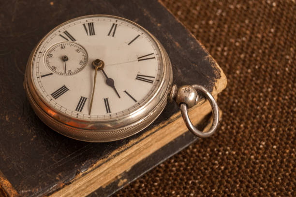istock Pocket watch and old Bible 949140466