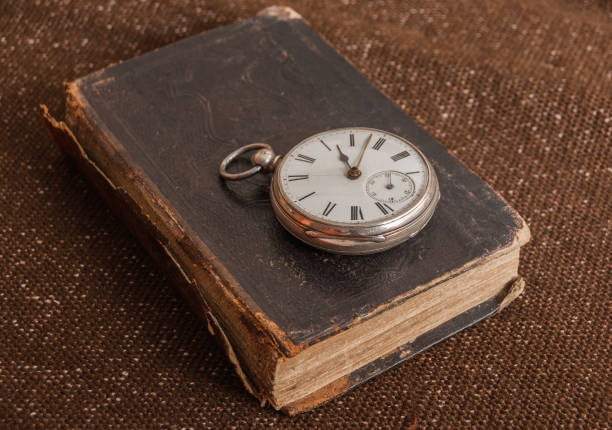 istock Pocket watch and old Bible 949140490