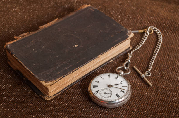istock Pocket watch and old Bible 949140524
