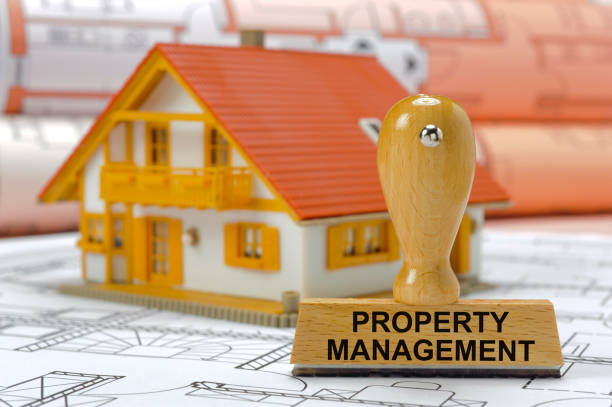 istock property management with model house and plan 949152290