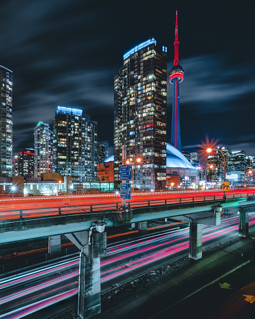 Epic futuristic and modern skyline views of downtown Toronto with the Gardiner Highway leading your eye to office buildings and condominiums.