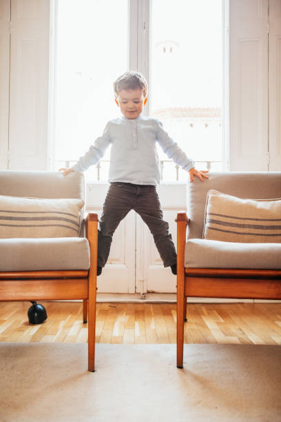 istock Boy playing in the living room 949164720