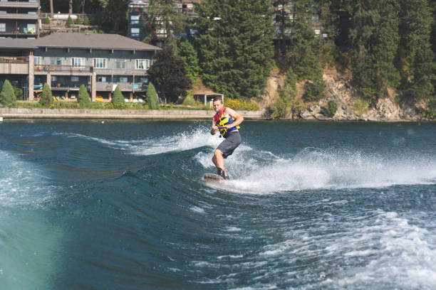 istock Male wakeboarder on lake 949170836