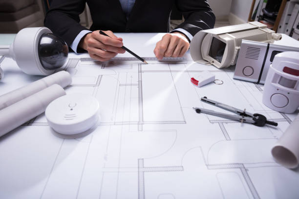 istock Close-up Of An Architect's Hand Drawing Blueprint 949178172