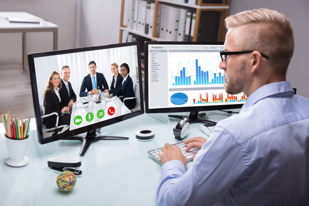 istock Businessman Video Conferencing With His Colleague 949178356