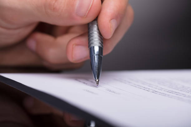 istock Businessperson Signing Document 949182682