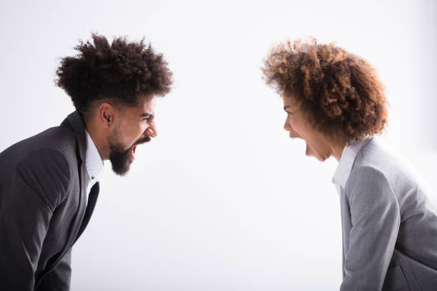 istock Two Angry Business Partners Shouting At Each Other 949183016