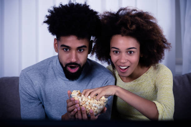 istock Shocked Couple Eating Popcorn 949183684