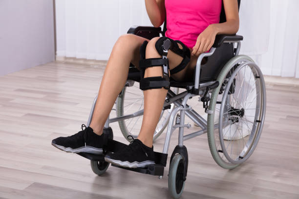 istock Female Patient Sitting On Wheelchair 949186274