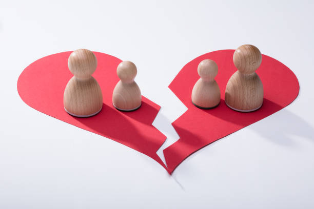 Wooden Pawns On Broken Heart