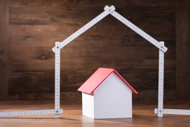 istock House Model Under The House Made With Measuring Tape 949187040