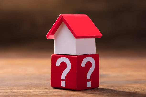 istock House Model On Red Block With Question Mark Symbols 949187264