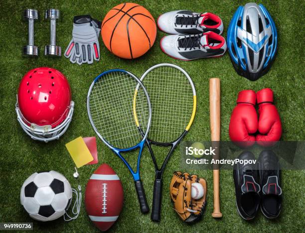 Various Sport Equipments On Grass Stock Photo - Download Image Now - Sport, Soccer, Soccer Ball