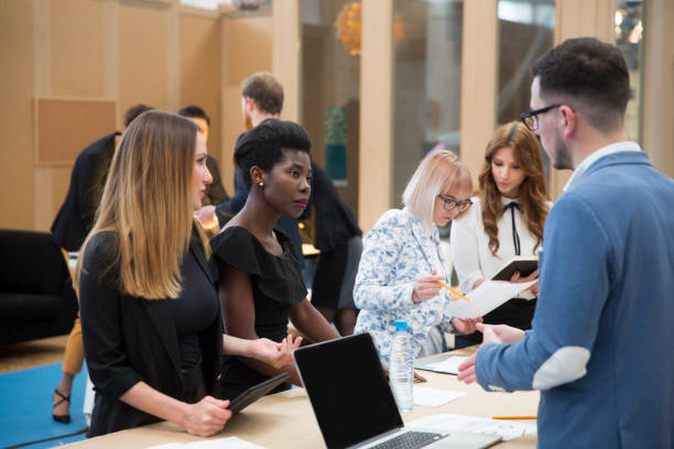 istock Business people in an office discussing 949196004