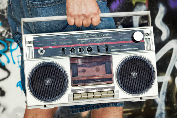 istock Person holding vintage boombox 949198762