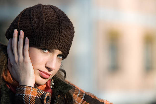 Woman smiling surprised in winter day