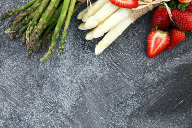 istock White and green asparagus with strawberries 949202704