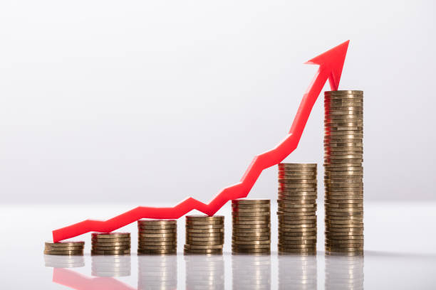 istock Close-up Of Increasing Golden Coins 949208232