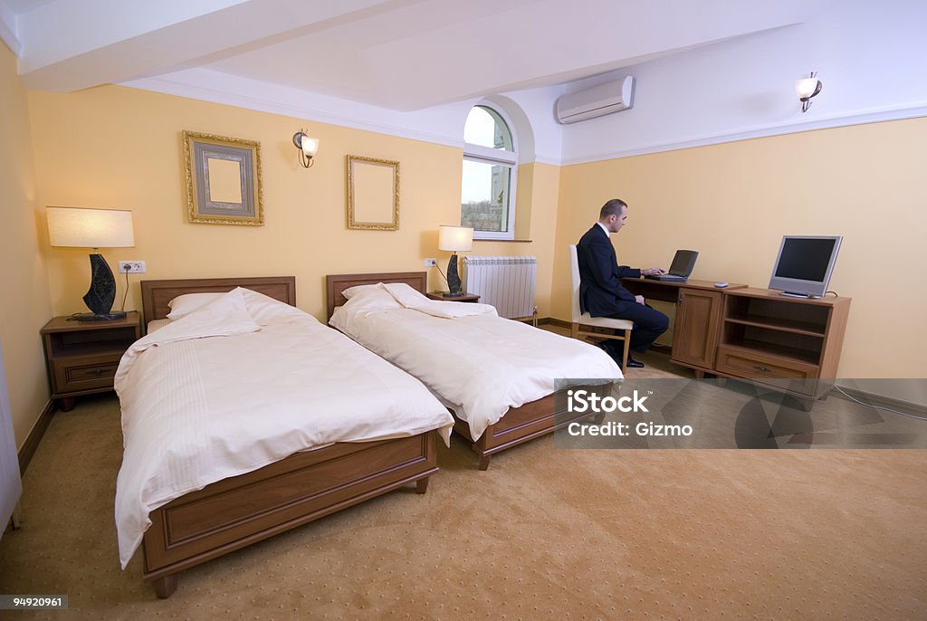 Trabalho do quarto de hotel - Foto de stock de Adulto royalty-free